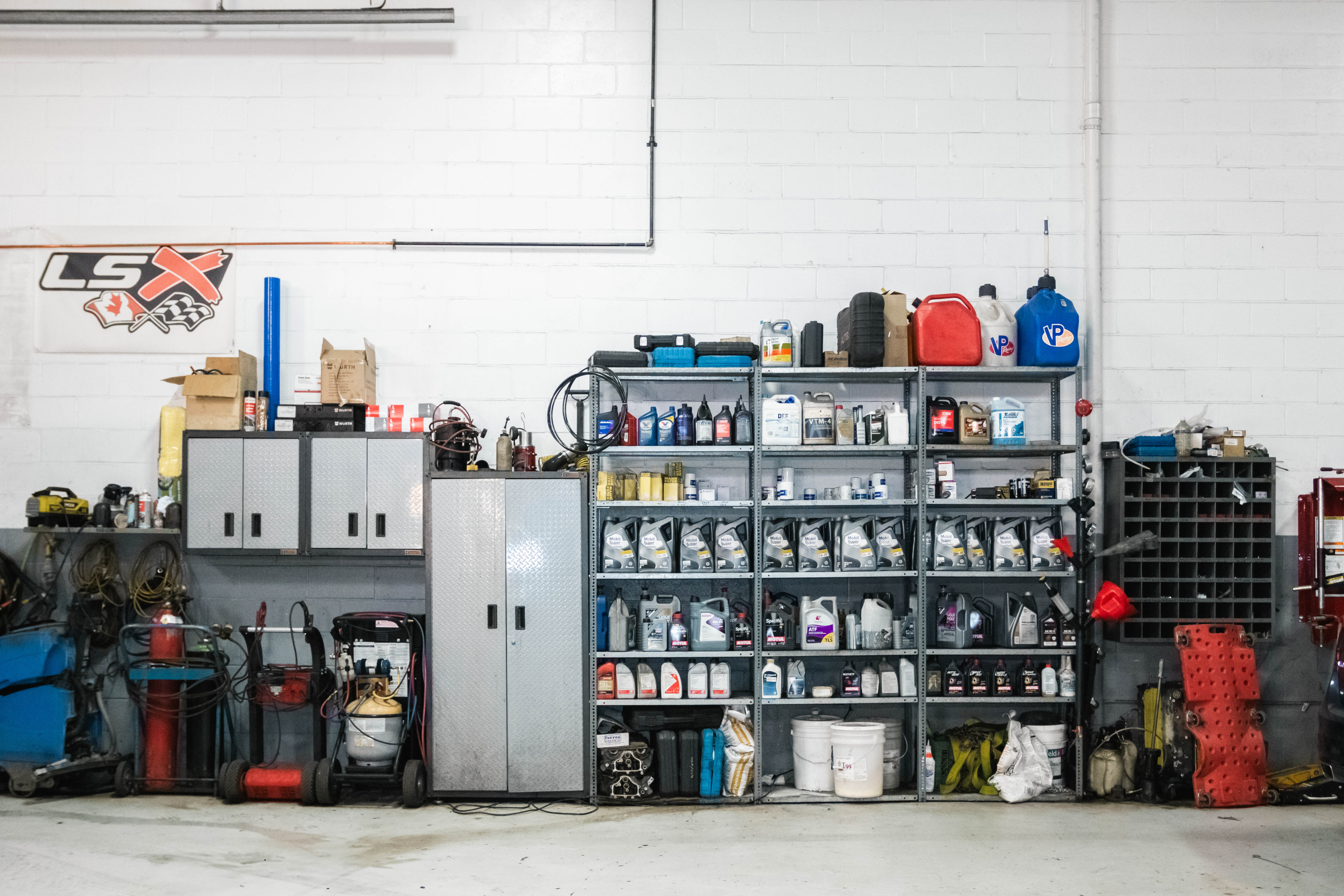 Auto parts shop shelves stocked with supplies and inventory